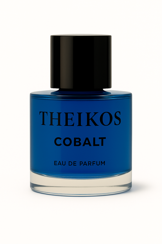 Blue perfume bottle labeled 'THEIKOS COBALT' on a white background